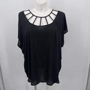 Torrid womans top size 3xL black short sleeve unique cut out neckline BoxK